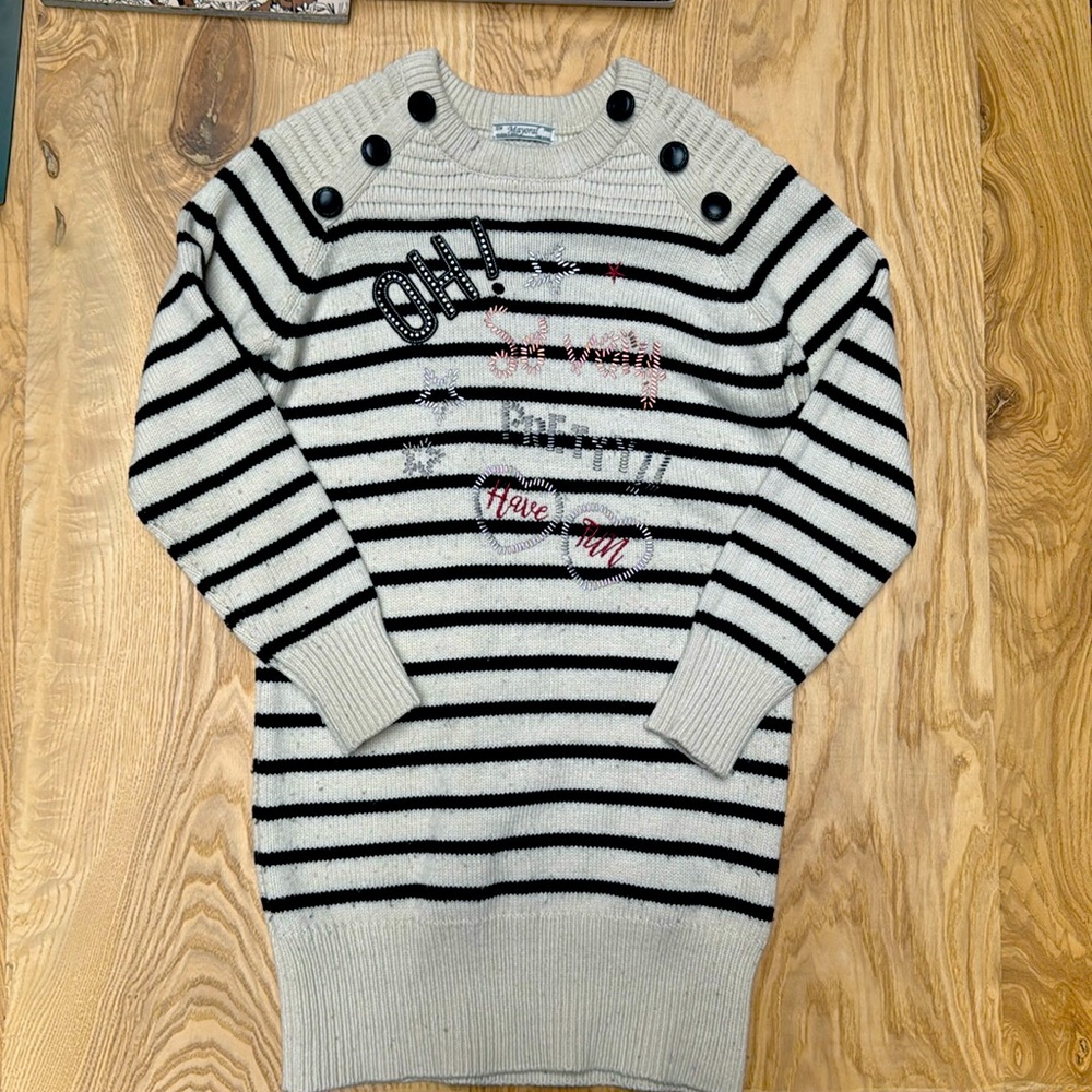 stylish,knitted garment a classic black and off-white horizontal striped pattern